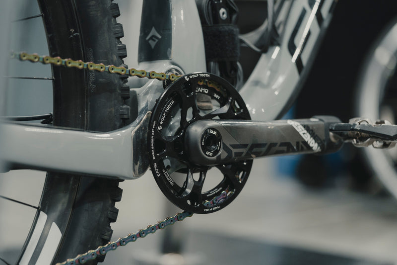 Load image into Gallery viewer, Wolf Tooth CAMO BashSpider for Shimano M5 Boost Cranksets | 52mm Chainline, 3mm Offset, Integrated Bash Ring Compatible with CAMO Chainrings, Alloy Material, Obstacle Clearance Technology, Designed for Trail & Enduro Cycling