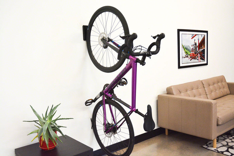 Load image into Gallery viewer, Feedback Sports Velo Hinge V2 Bike Hanger - Wall Mounted, 1-Bike, Up To 3.0" Tire, Black