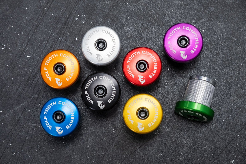 Load image into Gallery viewer, Wolf Tooth Compression Plug with Integrated Spacer Stem Cap - 7075-T6 Aluminum, Carbon & Metal Fork Compatibility, Stylish Purple Finish, Bike Headset & Preload Anchor
