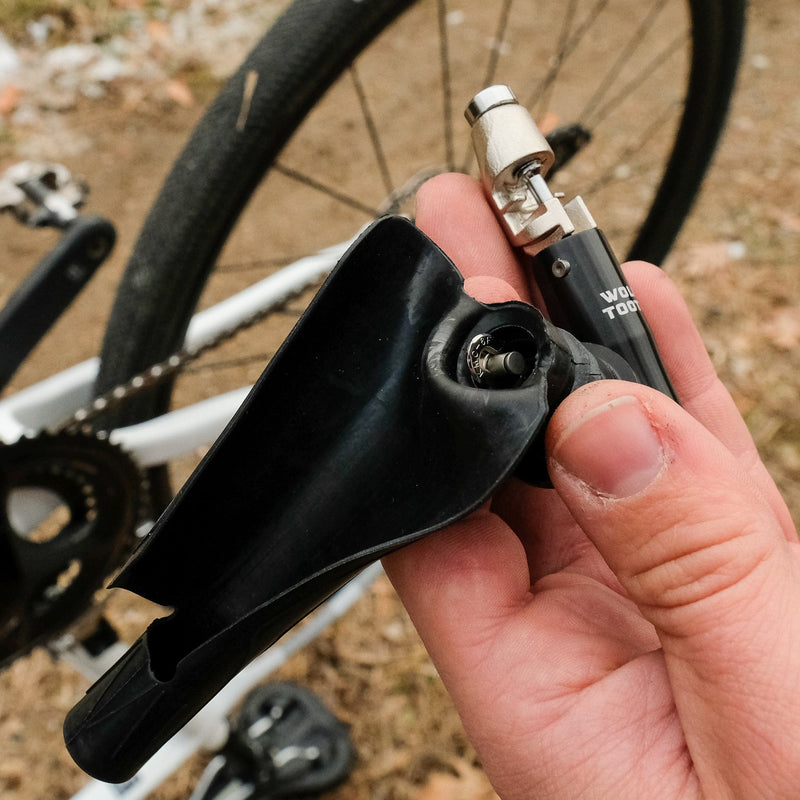 Load image into Gallery viewer, Wolf Tooth ENCASE System Storage Sleeves - Durable Aluminum Bar Plug with Vibration-Damping Rubber, Secure Trailside Repair Tool Storage, Custom Fit for Mountain & Drop Bars, Includes Extra Compartment for Presta/Schrader Adapter & Valve Core