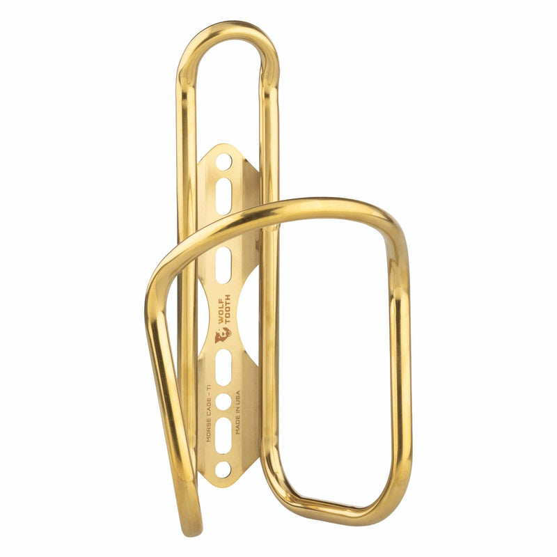 Load image into Gallery viewer, Wolf Tooth Morse Cage Ti Limited Edition - 64mm Mounts, 33g Ultra-Light Gold Titanium Bicycle Bottle Cage with 4-Position Adjustment, Handcrafted American Engineering, Low Profile, Durable, and Flexible for Cycling Enthusiasts