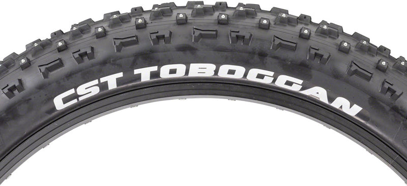 Load image into Gallery viewer, CST Toboggan Tire 26 x 4 Clincher Wire Black Studded Oversize studded tire
