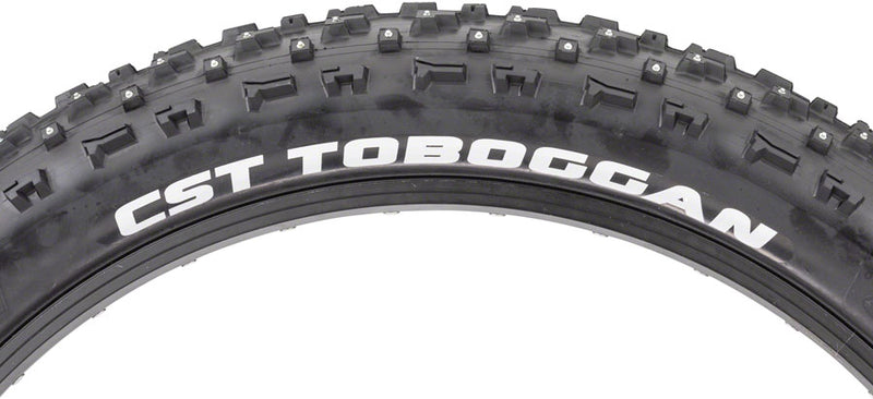 Load image into Gallery viewer, CST Toboggan Tire 26 x 4 Clincher Wire Black Studded Oversize studded tire