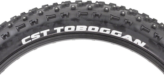 CST Toboggan Tire 26 x 4 Clincher Wire Black Studded Oversize studded tire