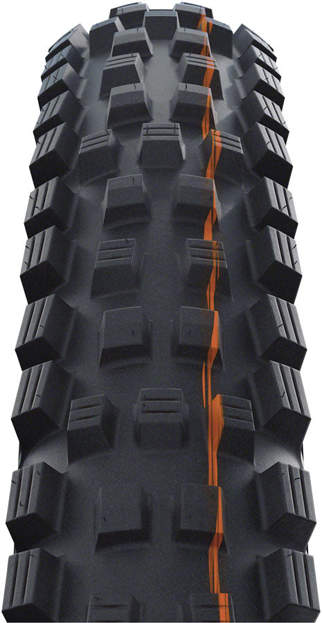 Load image into Gallery viewer, Schwalbe Magic Mary Tire - 29 x 2.4 Tubeless Folding Black/Bronze Evolution Line