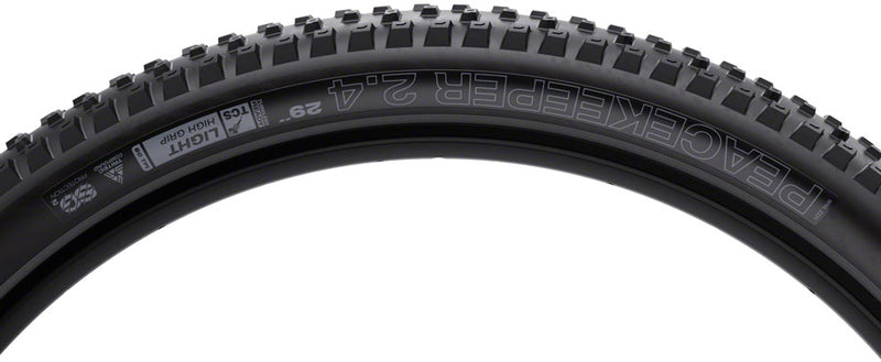 Load image into Gallery viewer, WTB Peacekeeper Tire - 29 x 2.4, TCS Tubeless, Folding, Black/Tan, Light/Fast Rolling, TriTec, SG