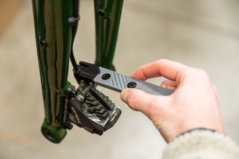 Load image into Gallery viewer, Wolf Tooth 8-Bit System Multi-Tool Kit | Lightweight, Durable 6061 Aluminum Bike Repair Tools with 22 Functions, Versatile Chainbreaker, Tire Lever & Rim Dent Remover, Pliers, and Cutting Utility Knife for Trailside Repairs