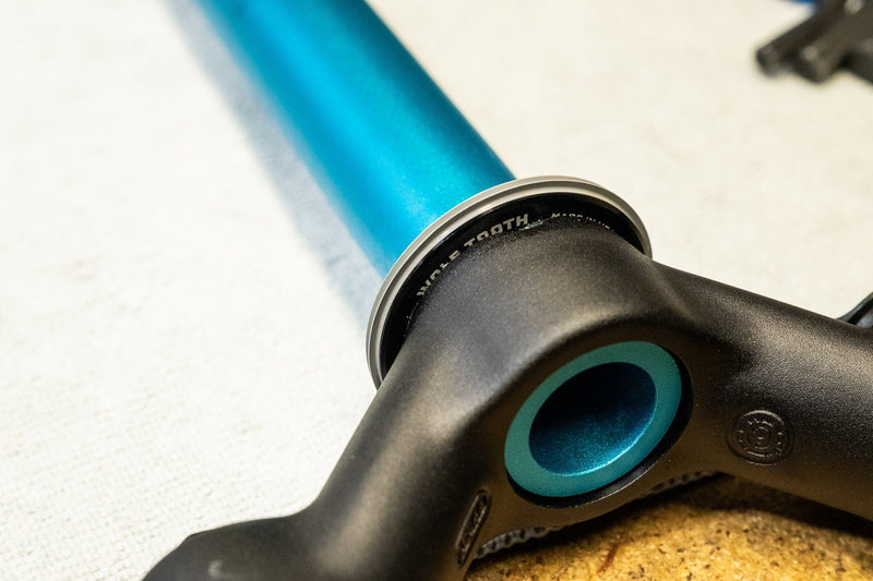 Load image into Gallery viewer, Wolf Tooth Crown Race Adapters - 1 1/4" Steerer to 1 1/2" Bearing Cup, Aluminum