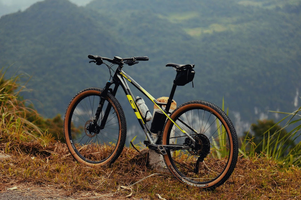 Mountain Bike Posed In Front of Hills