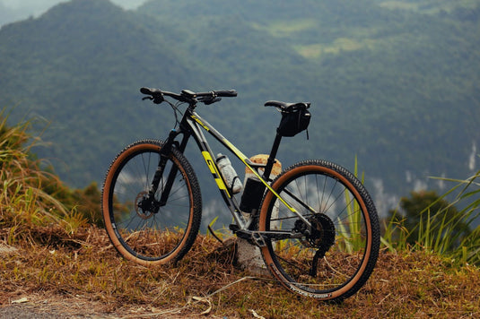 Mountain Bike Posed In Front of Hills