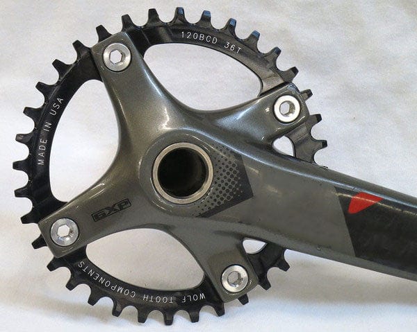 Load image into Gallery viewer, Wolf Tooth Drop Stop 36T 120 BCD Aluminum Chainring - Heavy-Duty MTB &amp; Road 1x Conversion for Maximum Chain Retention, Mud Clearing Drop-Stop Teeth, Compatible with 9-12 Speed Drivetrains, Black Lightweight Alloy Construction
