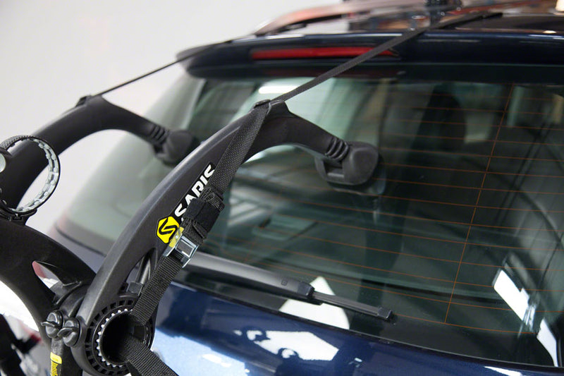 Load image into Gallery viewer, Saris Bones EX 3-Bike Trunk Rack Toptube Mount with Integrated Ratchet Straps
