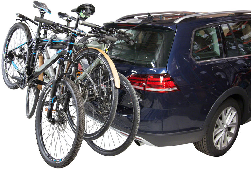 Load image into Gallery viewer, Saris Bones EX 3-Bike Trunk Rack Toptube Mount with Integrated Ratchet Straps
