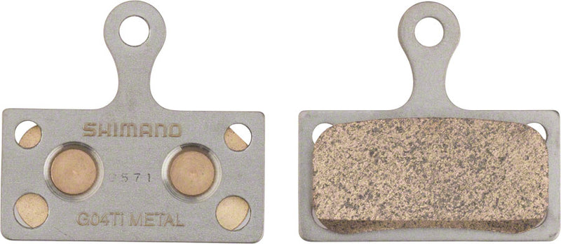 Load image into Gallery viewer, Shimano G04TI-MX Metal Disc Brake Pads &amp; Springs - Titanium Back Plate, High-Performance, Water-Resistant Cycling Brake Components
