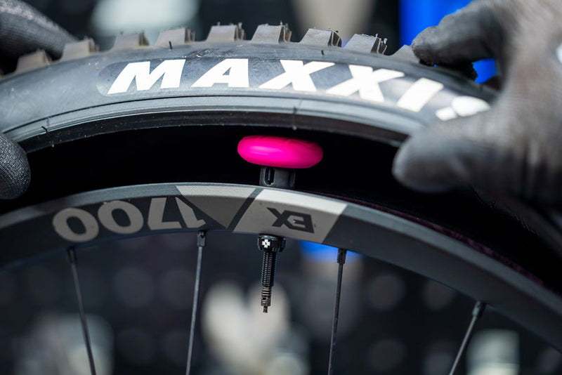 Load image into Gallery viewer, Muc-Off Stealth Tubeless Tag Holder for Muc-Off Tubeless Valves
