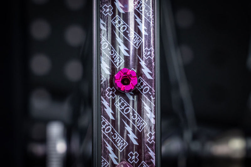 Load image into Gallery viewer, Muc-Off V2 Tubeless Valve Kit - Pink, 44mm, Pair 4mm Machined Allen Key Slot
