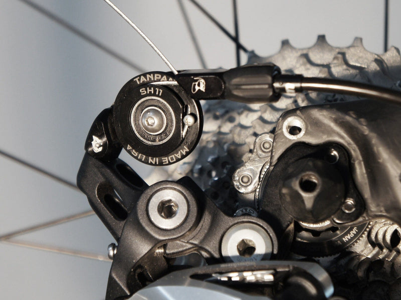Load image into Gallery viewer, Wolf Tooth Tanpan 10-Speed Conversion Kit for Shimano Road &amp; MTB Derailleurs | Stainless Steel Hardware &amp; Precision Engineering
