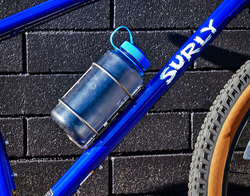 Load image into Gallery viewer, PDW Rattlesnek Kej Water Bottle Cage - Black, Left Opening
