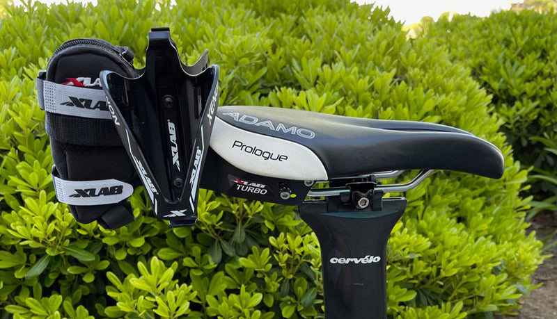 Load image into Gallery viewer, XLAB Turbo Wing w/ Xenon Cages Saddle Mounted Dual Water Bottle Carrier System
