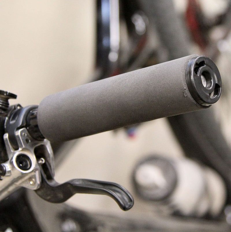 Load image into Gallery viewer, Wolf Tooth Components Pogie Bar Plug - Durable Black Replacement Bar Cap for Singletrack Pogie Handlebar Mount with Quick-Release Quarter Turn System for Easy Installation and Removal
