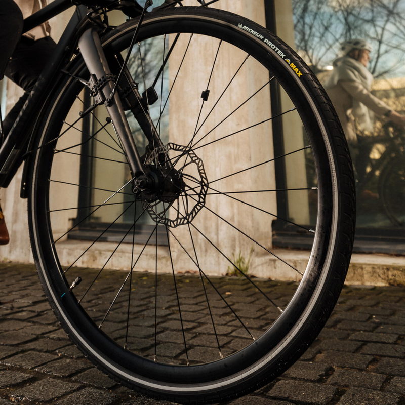 Load image into Gallery viewer, Michelin Protek Max Bicycle Tires 700c — Durable City Rubber Tread, 5mm Puncture Protection, Reflective Sidewalls, Ideal for Urban &amp; Commuter Cycles
