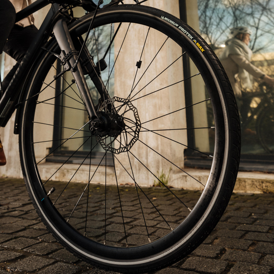 Michelin Protek Max Bicycle Tires 700c — Durable City Rubber Tread, 5mm Puncture Protection, Reflective Sidewalls, Ideal for Urban & Commuter Cycles