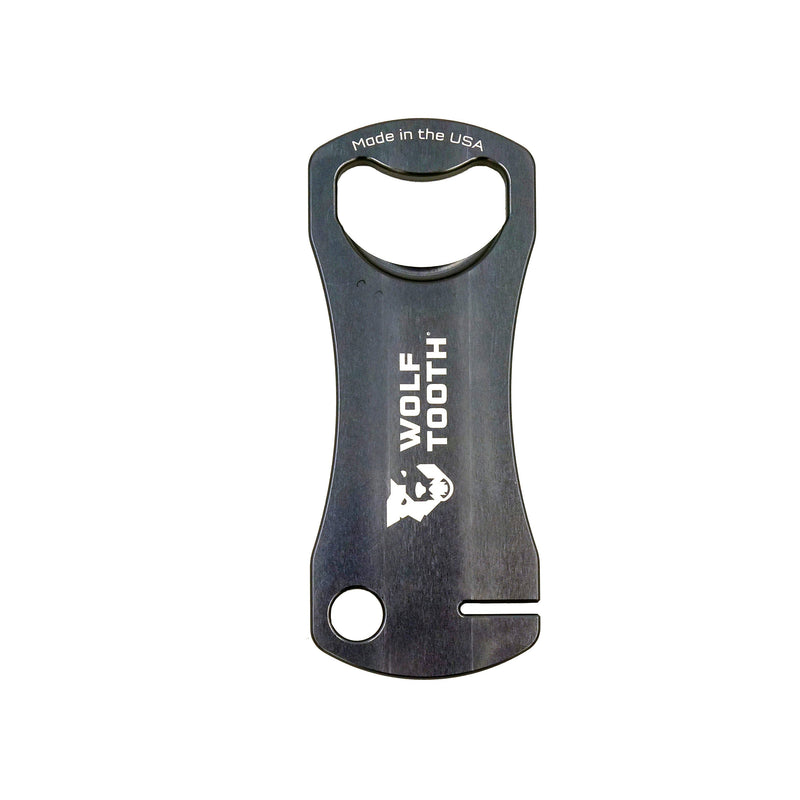 Load image into Gallery viewer, Wolf Tooth Bottle Opener With Rotor Truing Slot - Aluminum, Gunmetal, USA Made
